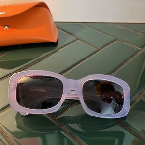 Sun Buddies Sunglasses; Junior, purple frame.